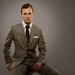 Businessman isolated on grey background
