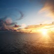 Photo: Beautiful sunset over an ocean Beautiful sunset over an ocean
