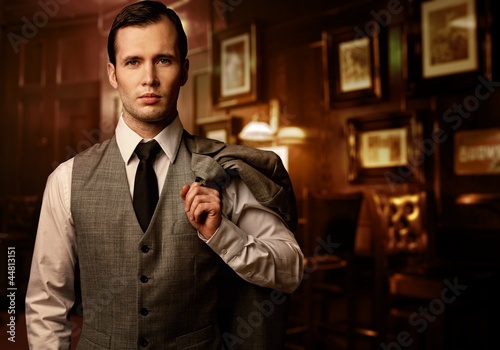 Photo: Man in luxury vintage interior Man in luxury vintage interior