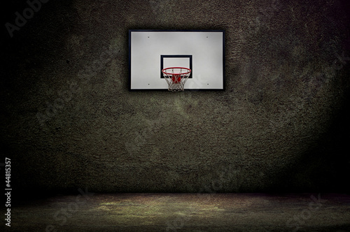 Photo: Basketball hoop on empty outdoor court Basketball hoop on empty outdoor court