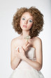 Portrait of beautiful bride female model on white background