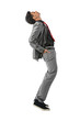 Asian man  wearing a suit leaning back.