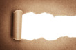 Photo: Brown package paper torn Brown package paper torn