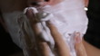 man shaves close up time lapse