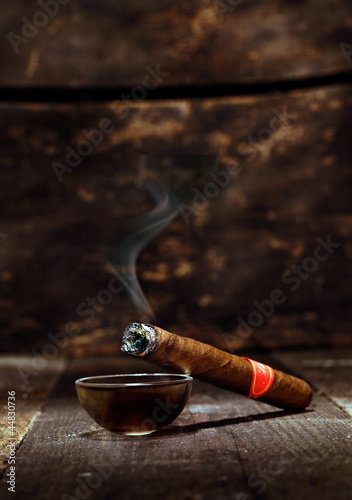 Photo: Burning luxury Cuban cigar Burning luxury Cuban cigar