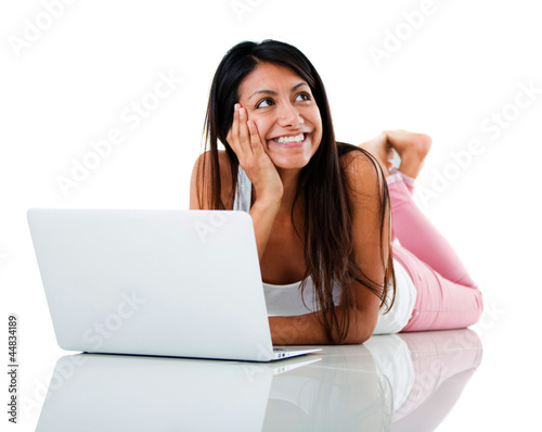 Photo: Thoughtful woman with a laptop Thoughtful woman with a laptop