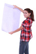 Woman looking at wallpaper
