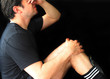 Soccer Player Holding Injured Knee