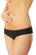 Fit young woman belly with hand on it
