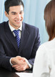 Foto: Happy businesspeople or businessman and client Happy businesspeople or businessman and client