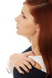 Woman heaving back ache