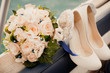 Wedding bouquet and bride shoes