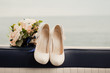 Wedding bouquet and bride shoes