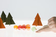 Woman playing pool with Christmas Ornaments