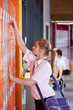 Student unlocking school locker