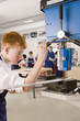Student using drill in metalwork class