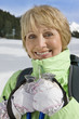 Close up portrait of woman holding ski poles