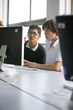 Teenage boys using school computer