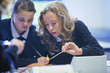 Girls experimenting with Bunsen burner in science class