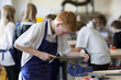 Boy using vice in school workshop