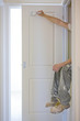 Painter painting door white
