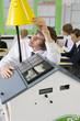 Photo: Student experimenting with solar panel and light in science class Student experimenting with solar panel and light in science class