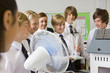 Photo: Students experimenting with model wind turbine in science class Students experimenting with model wind turbine in science class