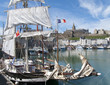 Old-fashioned sailing ship in harbor of Granville, France