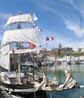 Old-fashioned sailing ship in harbor of Granville, France