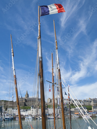 Photo: Old-fashioned sailing ship in harbor of Granville, France Old-fashioned sailing ship in harbor of Granville, France