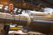 Engineer working on metal machinery