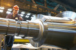 Engineer working on metal machinery