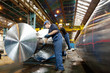 Engineer working on metal machinery