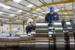 Engineer working on metal machinery