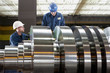 Engineer working on metal machinery