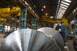 Engineer working on metal machinery
