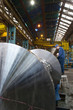 Engineer working on metal machinery