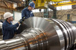 Engineers working on metal machinery