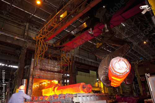 Photo: Molten forged steel being removed from furnace with crane Molten forged steel being removed from furnace with crane