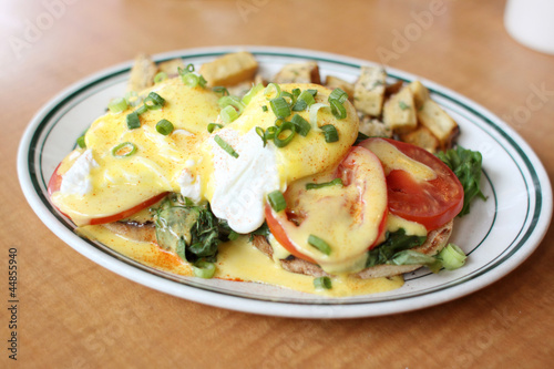 Photo: Delicious eggs florentine for breakfast at a restaurant. Delicious eggs florentine for breakfast at a restaurant.