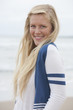 Portrait of smiling young woman on beach