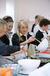 Students cooking together in home economics class