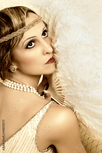 Photo: Retro pose with antique fan Retro pose with antique fan