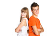 portrait of teenager boy and girl smiling isolated over white