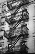 Façade avec escalier de secours noir et blanc - New-York