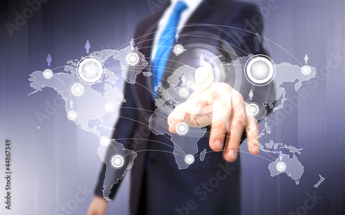 Photo: Businessman pressing social media icon Businessman pressing social media icon