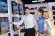 Photo: people buy in consumer electronics store people buy in consumer electronics store