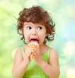 Photo: little curly girl with ice cream on colorful background little curly girl with ice cream on colorful background