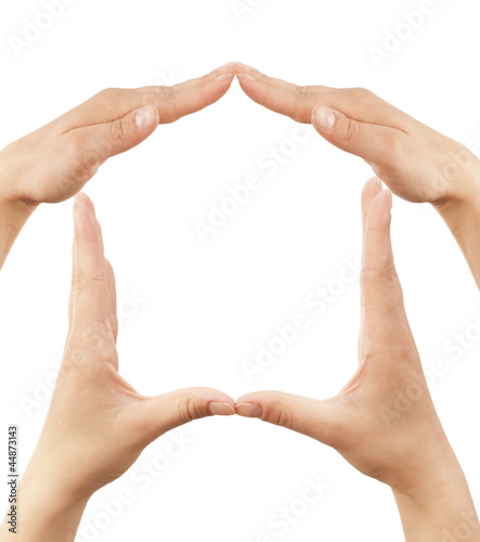 Photo: Female hands showing home sign Female hands showing home sign