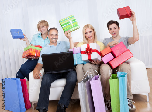 Photo: Family of online shoppers Family of online shoppers